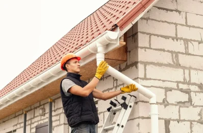 Pose et remplacement de gouttières aux Attaques